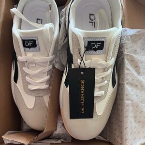 Woman’s De Florance White and Black Sneakers